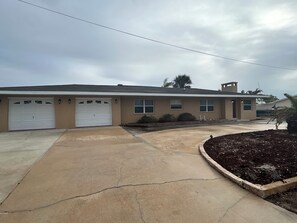 Newly painted outdoors with updated lighting for security