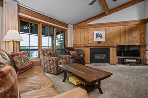 Cozy Living Room with Fireplace and HDTV