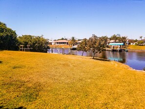 Huge backyard with boat dock and lift