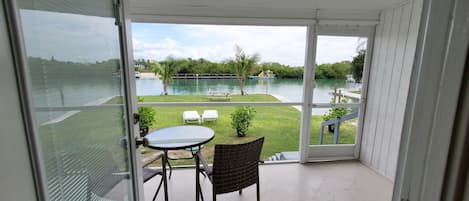 Your private screened patio has water views of the Venice Inlet