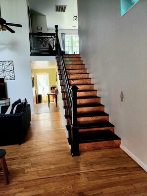 Livingroom to left, Loft at top of stairs with 2 Br and Ba upstairs