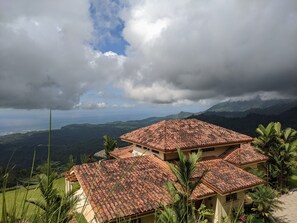 View of home from top of drive by gate