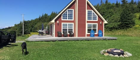 Front of the house with the firepit