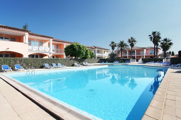 Spend your holiday lounging in the outdoor pool.