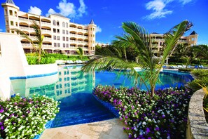 Two of the residence buildings and view of the upper pools.