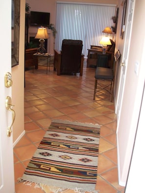 Entrance way into open concept living area 