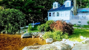 shore is shallow at first, good for kids! Then becomes deeper by end of dock.