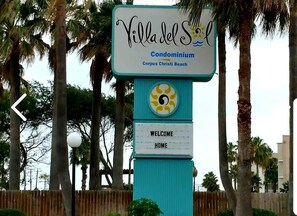 Welcome Sign to Villa Del Sol Condos.