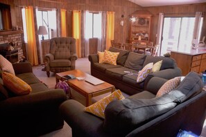 Spacious family room and dining room with open kitchen