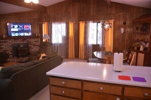 Spacious family room and dining room with open kitchen