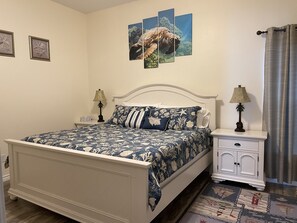 Bedroom has king size bed, 2 nightstands, dresser, closet, 42" TV with Netflix