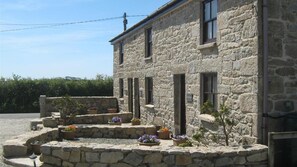 Rear view of property and garden