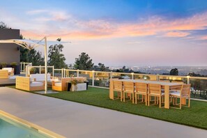 Dine out under the stars at the spacious 10-person alfresco table.