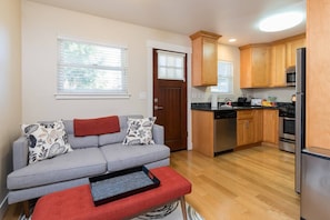 We start the home tour in the living room, which has a comfy couch