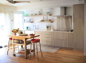 Magnificent Designer Kitchen, Induction Bosch Cooktop, Farm Sink, Door to Deck