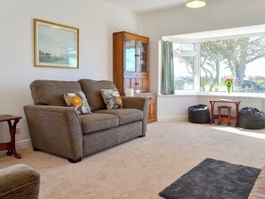 Comfortable and warm living room with wood burner | Wayside Cottage, North Frodingham, near Driffield