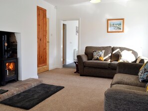 Comfortable and warm living room with wood burner | Wayside Cottage, North Frodingham, near Driffield