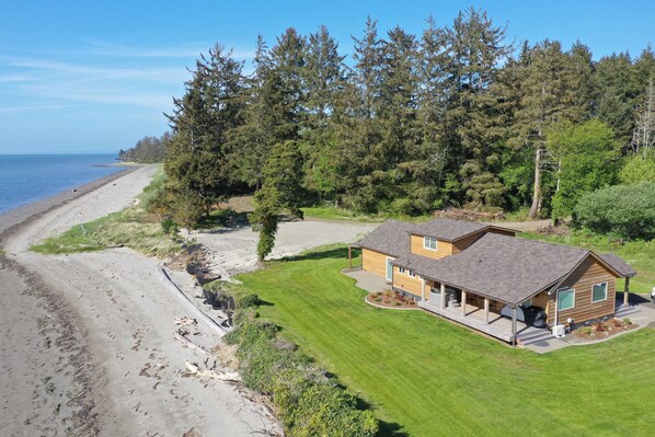 Aerial view of private beach steps outside the back door