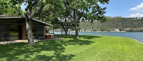 Beautiful Lake Austin home facing Mount Bonnell on Isaac’s Slough, boat slip