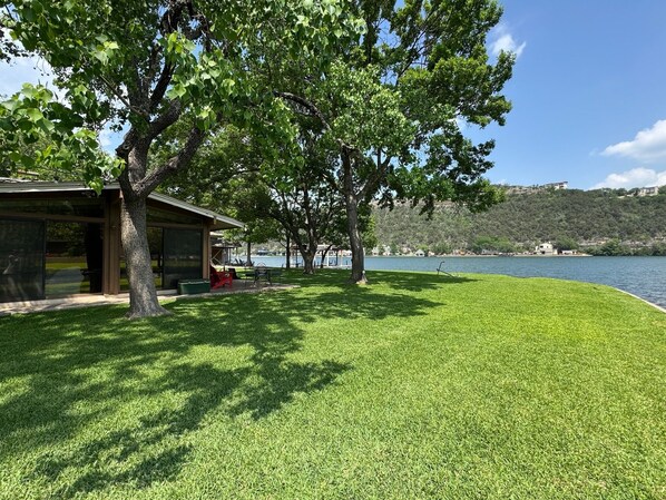 Beautiful Lake Austin home facing Mount Bonnell on Isaac’s Slough, boat slip
