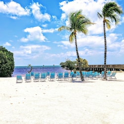 Private Sandy Beach with New Lounge Chairs