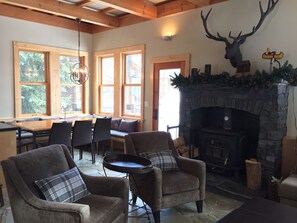 Living and Dining area with wood burning stove 
