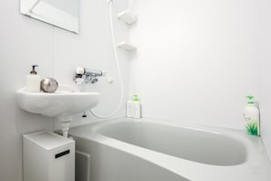 Take time to unwind with a deep soak in your private bath, complete with complimentary bath products