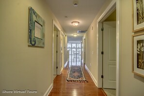 Hardwood flooring throughout the condo living areas