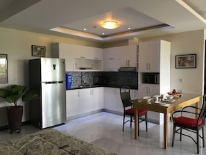 full kitchen and dinning area