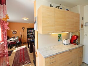 Room, Property, Interior Design, Furniture, Countertop, Floor, Cabinetry, Kitchen, House, Building