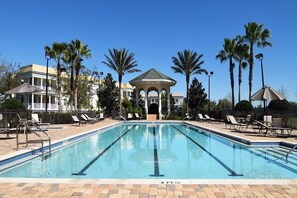 Beautiful community pool directly opposite the condo. Loungers, jacuzzi, grills