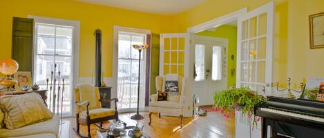 Living room with pull out couch at Victorian Cottage