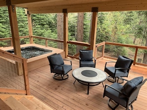 Lower deck with Bullfrog hot tub and comfy lounge area- (not a fire pit)