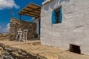 Enter the Cave through the sunset terrace, tucked away in the farmhouse