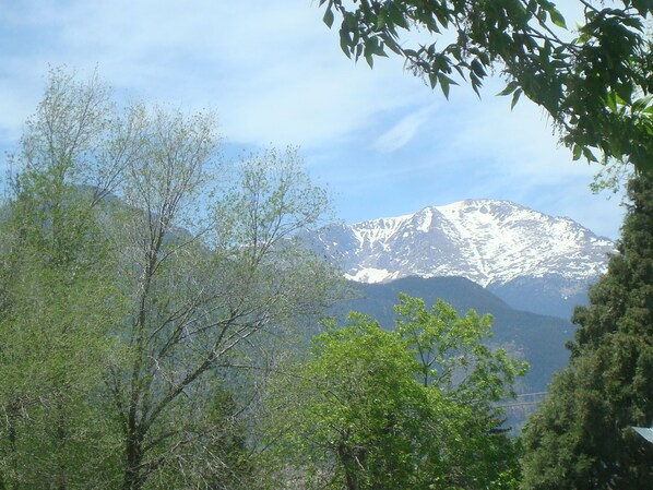 VIEW OF PIKES PEAK FROM THE FRONT PORCH AND SOME WINDOWS