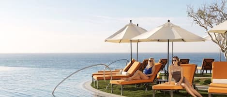 Infinity pool with full service swim-up bar. Incredible sunsets!