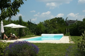 Pool with motorised cover