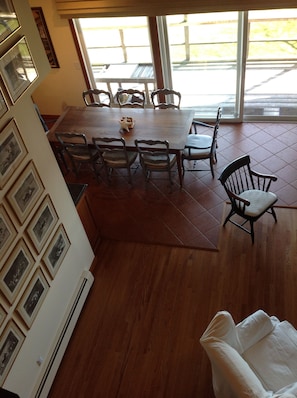 Upstairs dining area seats eight looking out onto the water