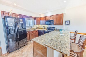 04-Surf-Or-Sound-Realty-807-Solar Reflections-Kitchen-01