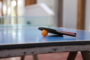 Play a game of table tennis in our courtyard