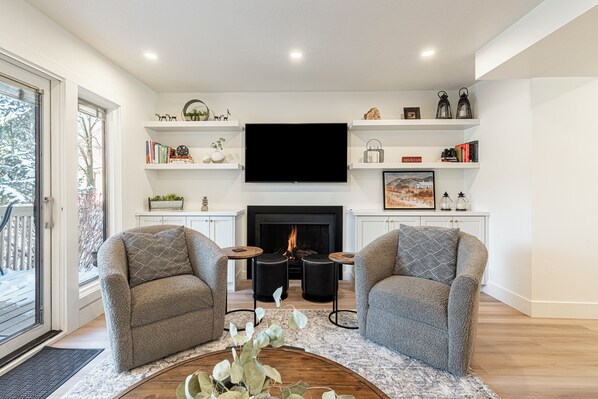 Modern rustic charm with a cozy elegance Living Room, a fireplace, and a Smart Tv