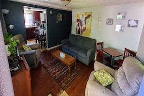 Livingroom - ( Sofa with a hideaway queen bed, 2 Lazyboy chairs, activity table)