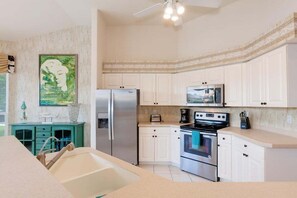 Solid surface counter tops and stainless steel appliances