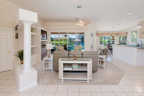 View of the living room and kitchen from the front door