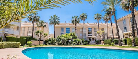 Communal Pool with beautifully manicured gardens