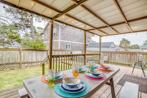 Backyard seating with Hot Tub in view