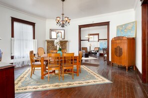 Formal dining area with seating for 6 at table.