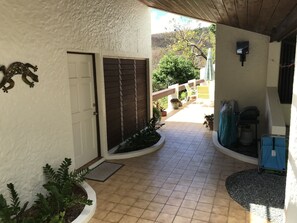 Guest bedroom and laundry room on left