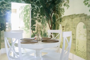 Dinning area with an amazing wallpaper