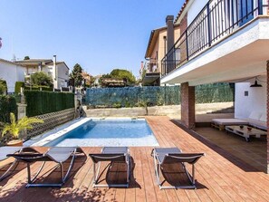 Front of the home and pool